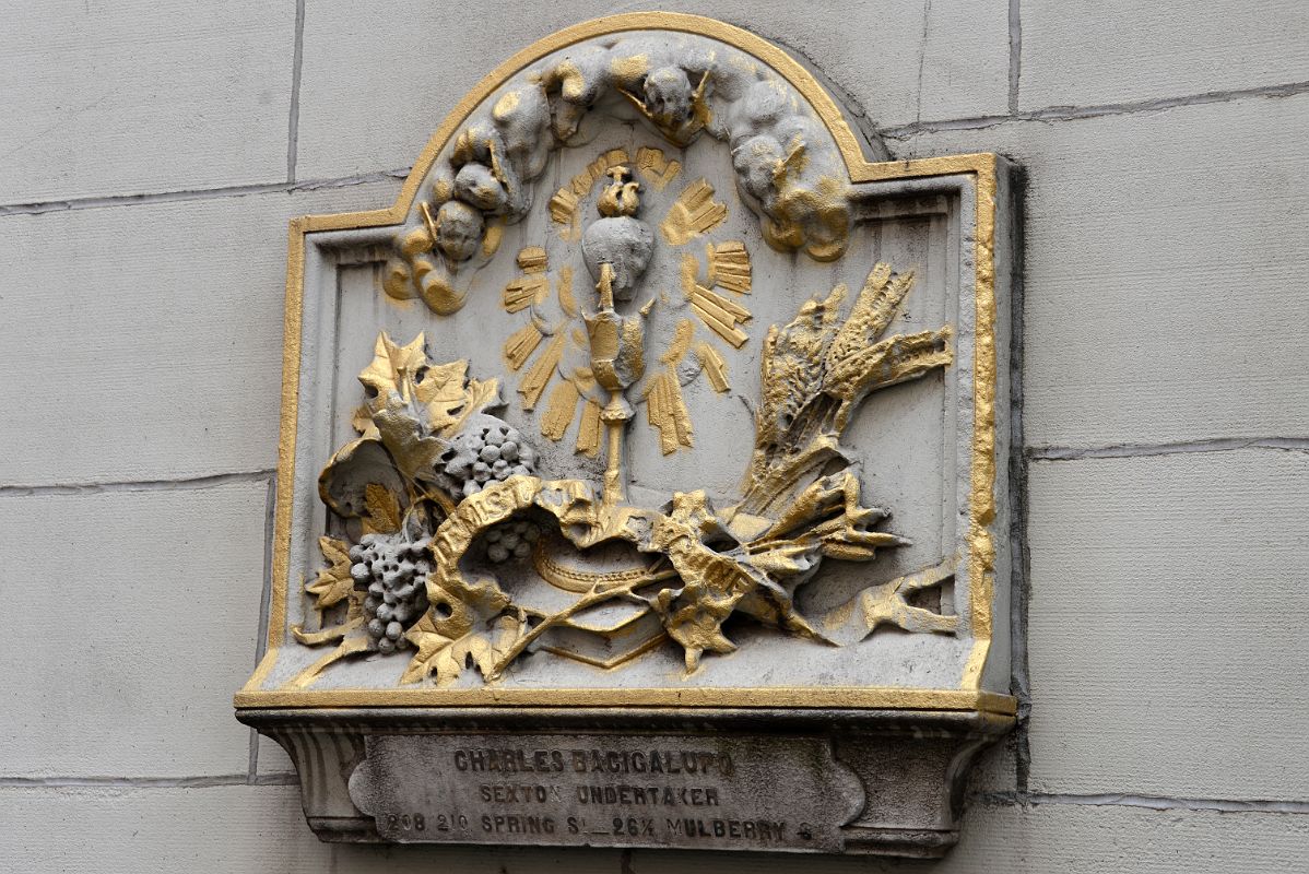 02-3 Charles Bacigalupo Sexton Undertaker Under A Carving At Church of the Most Precious Blood At 109 Mulberry St In Little Italy New York City